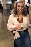 I absolutely love this sweater! The material is great and it's very trendy with the tie front. I wore it to a winter beerfest with jeans and booties and got a few compliments! I definitely recommend purchasing! - Lauren W.