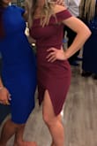 I love this dress but I had to constantly keep pulling it down for it to look appropriate. Otherwise the slit was way too high. I also bought a small thinking it would be good solution to my problem but it was WAY TOO BIG on me. - Mary G.