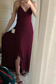 I ordered this dress for prom. I returned it because it was too casual, but still a VERY pretty dress. I have a small bust, so I was worried the chest would be too loose, but the "corset" in the back allows you to tighten it as much as you need. Slit is more open than shown on model so just be careful in the wind. beautiful color. Lulus has some rly gorgeous dresses! - Tess R.