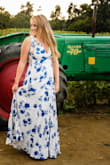 Perfect dress all around! Photographed amazing in my engagement photos. Possibly runs a little long but I'm 5'4 and wore wedges and it was perfect! - Macy P.
