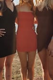 I loved this dress. However, its very easy to shrink. I put mine in the dryer for too long and it shrunk so so bad. - Grace M.