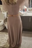 Dress is very pretty, and real long. The back opening was a bit off for me, I envisioned it different, but it might've been my height. Went with another dress instead. Fit like a regular dress would I don't think it runs small or large, I ordered a medium - Giovanna G.
