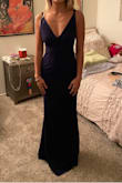 This dress was great quality, that thicker material that lays nicely and fits snug (in a good way), but I think my upper body was a little too short, the straps didn't look right. - Nicole B.