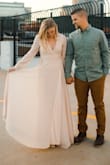 I love the flowy-ness of this dress. It was perfect for my engagement photos. The dress fit perfect thought out the shoulders and chest, but was a little long. I ended up wearing wedges that are a few inches tall and still felt like it was a little long-would have gotten it shortened, but I didn't have time. Overall it ended up being perfect. - Taylor B.