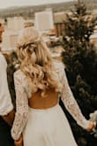 This dress is absolutely beautiful!! I wore it for my wedding and received so many complements :)
The dress was much too long as were the sleeves. The sleeves were very baggy too. I had the dress altered and after the adjustments were made it was the wedding dress of my dreams - Julie C.