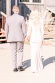 This has become one of my favorite dresses I've ever owned. I felt like a princess during our engagement photo session. I loved the color, the fit, the fabric, and the button detail on the back. It was a little long for me, I did not do alterations. I just wore heels and was mindful of our positioning and poses in the photos. Recommend!! - Kaitlin C.