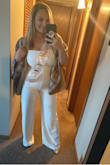 I wore this jumpsuit to a last minute shower with my friends before my elopement. I love the fit of it. It is a little long on me even in heels so before I wear it again I'll get it hemmed but I definitely recommend it! - Emily K.