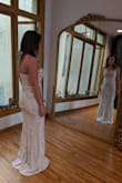 Dress fit like a glove but by pairing it with spanx and sticky bra, I feel UNSTOPPABLE! The only alterations I had were hemming the dress about 5 inches only in the front. - Ana E.