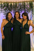 My girlfriends and I decided to all wear this dress to our BFF's out of state wedding as her "unofficial" bridesmaids. While we're all very different sizes, it seemed to fit all of us perfectly! I am muscular so my height/weight doesn't always align with my size, but the Medium fit perfectly. (I'm glad too, as I was considering ordering the large just in case.) The length was perfect with heels! The jersey material looks so much more elegant than I would think this material could look. The dress itself feels pretty heavy, which I suspect is due to the fact that it's got 2 layers of the jersey on both the top and bottom. The straps were so much fun to create new looks. My sister and I actually switched up the straps 3x throughout the night to mess with people. It was great! We even had a bartender come around the bar to ask us about our dresses, remarking how fabulous it looked. - Amanda K.