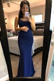Absolutely loved this dress! Wore it as a bridesmaids for a recent wedding. Received compliments on the style and fit. The blue in the picture is a bit more on the royal color palette. Nonetheless I would wear this again to a gala or another wedding. Looking for another excuse to wear it! - Scarleth G.