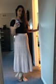 I wear the skirt for my friends bridal shower and I absolutely loved it. It's super cute and flattering and I got so many compliments on it. - Gabriella H.