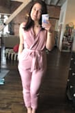 This jumpsuit is a dream! Beautiful light mauve in color, comfortable but structured material, and super flattering. I have an athletic pear shaped body and it hugs every curve. The bust is a little revealing but nothing a pin or bandeau can't fix! The only downfall is it's difficult to take off as it is a slip on, not zip up but for all the pros this con isn't a big deal to me. I wish there were other colors! - Katherine H.