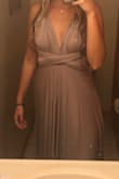 I wore this dress as a bridesmaid dress in a family friends wedding! It was nice for the summer because it isn't a crazy thick material. This dress is so much fun for a bridal party wearing the same dress but in different styles because you can wear it in a million different ways. It is a great length and doesn't drag as you walk. The color is beautiful on almost every skin tone. - Jen C.