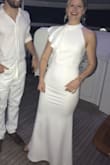 I loved this dress. I left like I was in a James Bond Movie in it. I had to have it tailored but only because I couldn't wear heels to the event. The dress was super comfortable and true to size. - Molly S.