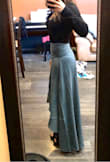 I'm usually either a S or XS. After reading the reviews, I ordered an XS. I think that was the perfect fit. It just looks a little bulky on my lower belly, but it's not - weird fabric or something. Might be better with a crop top instead of bodysuit. Photos are right out of the bag, so definitely needs a steam, but I love it! I'm short, athletic build, and the length is perfect with heels. - Sofia S.
