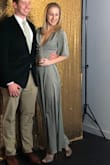 I got the XS and it fits me perfectly in the waist (trust the sizing guide!) I was surprised it fit so well because usually stuff hangs a bit lose on me because I'm somewhat skinny for my height. That saying, I would suggest ordering a size up if you're not sure or like things looser, and either exchange it or get it tailored if you feel it doesn't fit quite right. Or if you have the time, order two sizes and return one. I was in a bit of a time crunch.
I love that there's full coverage in the back (nice if you struggle with back-acne) It's a little long so if you're not wearing heels, plan on hemming it. Highly suggest wearing some sort of slip underneath, or nothing at all, because you'll get pantie lines no matter how skimpy your underwear is. There's a lot of fabric in the skirt but it clings to your legs because of the material, nicely. - Meg C.