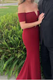 A bit loose in the arm holes so I was having to pull it up throughout the night (and I do not have a small bust). Other than that, it was lovely. Even having to bend down to take photos (with those shorter than me) it looked good. - Alexandra F.