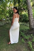 This is one of my favorite dresses! The material feels so soft and good quality. It is not see through at all, which is one of my concerns when buying white clothing. Was perfect for my vacation! - Simeris