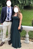 Wore this for my cousin's wedding. It was long in length so being 5 ft tall, I did need to go to a tailor & get the dress hemmed. The slit also started very high which was unusual, all the way up to the waist, so I told my tailor to add a stitching so the slit started more along my upper thigh. By the end of the night, my shoulders had markings from the straps since there wasn't a lot of support or padding in the breast area. A bit overpriced since I needed the dress tailored so much but overall, dress looked nice and was comfortable dancing in. - Paula G.