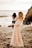 The perfect dress for our family pictures on the beach. I wasn't sure about the color on my skin tone, but it looked great! Would highly recommend! - Lauren H.