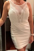 I like this dress I thought it was cute but it rides up and the lining shows underneath when it does. I would've ordered a size bigger so that it wouldn't have been so tight I'm usually a 6/8. - Laura T.