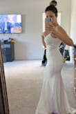 I've been looking for an inexpensive dress to wear for my wedding reception and this one fits great without the high price tag. It accentuates all the right curves. I'll need to get it hemmed, but for the money I paid, the added cost is nothing. - Lissette L.