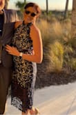 I wore this to a wedding and received sooo many compliments! The dress is gorgeous and I felt beautiful in it! I ordered both a large and a medium because I thought it might be little right on my hips but the large was big around my armpits and baggy on the waist so the medium, which I normally wear now, fit perfect! My only complaint is about the neckline. It kept folding under, probably because of my saggy boobs. It didn't bother me that much and still was gorgeous! I highly recommend! - Alicia W.