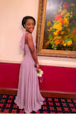 I absolutely love this dress! It does feel a little too long. I'm some occasion I had to hold it but when I started to walk the fabric flows so I did not have to keep holding it. The small was too large for me so I exchanged it for the XS which fits perfectly!! I love it!!! - Patricia D.