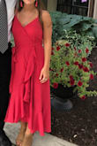 I loved this dress and wore it to my best friends wedding. I did end up having to pin the top a little as there was too much cleavage showing. The bottom was fun to dance in though! - Marina N.