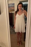 I adore this! I ordered both a medium and a small, and the medium was just too big and baggy. The small fit perfectly. It's very comfortable and looks cute and flirty - the perfect dress for a hot summer day. It's not too sheer with the lining, although I do wear petals with it. The lining is a bit short in back, but it didn't feel too short overall because the lace skirt part is long enough. - Amanda O.