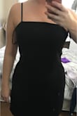 This dress is amazing. I sized up to a medium after reading reviews and I'm usually between a small and medium in dresses. I have a smallish waist but bigger hips and butt. Since this ties in the back it is adjustable for your chest and waist. It feels like this dress is tailored to my body, I love it! I have always wanted an almost body-con dress that flattered my curves but wasn't too tight. This is perfect. Keep in mind it isn't stretchy though so I'd suggest sizing up if youre unsure. - Madchen Z.