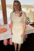 I wore this to my wedding shower and loved it. Perfect length - feel just at/below my knee and felt comfortable in this. It is comfy and not too constricting. Gives a nice sleek shape but is still appropriate for something like this. - Megan R.