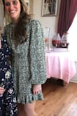 I tend to be in between sizes- ordered both a small and x- small. The back on the small was very loose and droopy. XS was perfect. The dress felt a little short when sitting- but otherwise great! - Jennifer S.