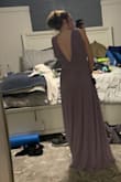 It's a great dress I really love the color and it fits really well. It is a little long and the sleeves are a little loose but overall wouldn't change anything. - Lindsey S.