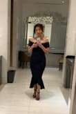 I had tons of compliments on my dress and you can see why! It hugs every curve of your body, the bodice gives off the illusion that you have breasts w it's sweetheart neckline. The off-shoulder look accentuates your collarbone and shoulders. I only stand 5'2" but the trumpet bottom is just the right length. It was a very comfortable dress. I never once had to tug up. I ordered a S. - Claudine G.