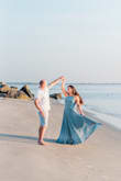 I originally purchased the forest green color for a bridesmaid dress and it was PERFECT. I loved it so much, in fact, that I purchased this light blue one for my engagement photos. The sand and dirt rinsed RIGHT out and I've never had a problem with either staining or washing on delicate in the washer (lay out flat to dry). This is a great option for bridesmaid dress or even a simple wedding guest dress. 

I think the great appeal to this dress is that the delicate (but sturdy) straps are adjustable and end up bringing the length down/up enough to get by without needing to hem. - Melissa D.