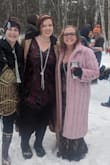 I ordered this for a 20's themed outside party in the snow! It was amazing! It was a lot warmer than I thought it would be!! I was about to fit a small puff jacket under it to keep warm and you couldn't even tell. I ordered a L so I could layer if I needed it and it worked out perfectly! And not to mention all of the compliments I got just made it even better! - Megan C.