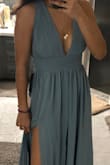I usually wear a size small in almost everything, because I want to be comfortable and I don't really like super tight clothing. I read some other reviews that said that the waistband for this dress was unforgiving, and if you don't want it to be super tight then size up, but I say don't!!! I ordered an XS mostly because I did not want the chest area to be too big on me and I am so glad I did. Everything about this dress fits me PERFECTLY and now I know that if I ordered a small it would be too large, which is weird for me. However, the one con with this dress is that it was definitely on the longer side so I may be getting it hemmed. Overall, absolutely BEAUTIFUL dress! - Ashley L.