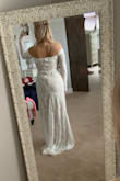 I bought a different dress for my wedding but when I saw this one (and the price!) I had to order it. Once it came I knew my original dress was history and this was the one! It's exactly what I envisioned for my dress. Simple, sexy, classy and romantic. I love anything off the shoulders and this is perfect. - Laura W.