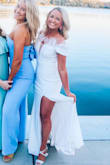 it fit perfectly and looked just like it did in the picture! I got so many compliments on it- one of my favorite dresses by far! - Emily B.