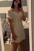 I absolutely loved this dress! It wasn't see through and the length was great. I ordered a size S but should've gotten an XS. I ended up finding one I liked better so I just returned this one. The bust area runs quite large, it was pretty baggy on me. - Savannah G.
