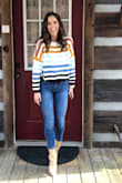 I've been wanting this sweater for a long time! So when I saw it was restocked I ordered it immediately! I usually order XS but went with the small since it's cropped. It's loose fitting but that's how I wanted it. I am so glad I purchased this sweater! Love the colors too. - Ashlyn H.