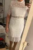 I ordered this dress as a contender to wear for my wedding Groom's Dinner. The quality of the lace is nice and a pretty pattern. It's a thinner type of lace and the lining is pretty thin as well leaving any bodily imperfections to show through. Spanx could help this if you have a good pair, but with the opening at the waist and the shorter inner lining, I personally wouldn't want to wear them. The length of this dress is great, even on someone shorter like me. I'm indifferent but don't dislike it overall. - Macy I.