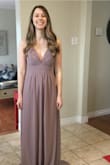 Beautiful dress, not too low in chest. Was a little loose, will have to get it taken in a bit. But excellent dress and unbeatable price - Emily N.