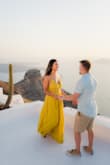 I wore this dress for my engagement photos in Greece! The yellow was perfect for my skin tone, and I felt beautiful in it! Only thing is, it's pretty heavy so it may not be the best in really humid weather. If you want airy and light, this isn't that. BUT if you don't care, this dress is GORGEOUS. - Keanna V.