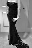 Everything you want a dress to be but can never seem to find. Looks and fits better than a $2000 dress of the same style that I rented last year. It fits snug, but not 'tight' and fits my (curvy) body perfectly, but it's also one of those dresses that you know will look good whether you are 5-10pbs lighter or heavier. I could easily still wear a small at 140 (and hey-sometimes that's me.) boobs aren't hanging out over the top, but it's tight enough that you still look super shapely. Length was perfect, I always wear 3-4" heels though. I did have to mind my train, as my heels wanted to get caught in the sequins if I wasn't careful that is my ONLY comment that isn't 1000% positive. (And I'm in my 40's classy-not trashy, but still very flattering) - Allison B.