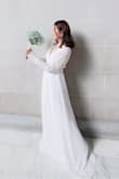 Elegant and pretty. Fit very well. But a bit long even wearing high heels - Pei Y.
