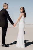 I LOVED this dress! I ordered a small and medium. I decided to go with the small because the MD was a little too big around my bust area. I definitely had to wear spanx underneath, but overall it was the most perfect wedding dress for my courthouse wedding! - Corinne R.