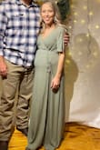 I'm normally 105 not pregnant so ordering clothes that actually fit is hard! I'm short so naturally it was a little long on me but if I threw on heels it would be the perfect length! I'm 33 weeks pregnant in the picture and it was perfect for my baby shower! - Holi M.