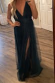 This dress is stunning. Is a little long. Green color is as shown perfection. - Hannah H.